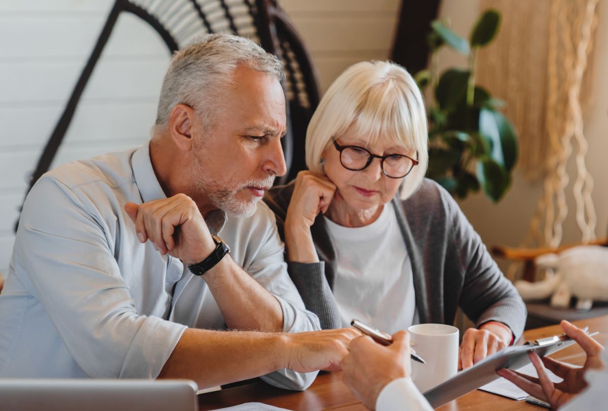 Senior couple at a meeting with their advisor