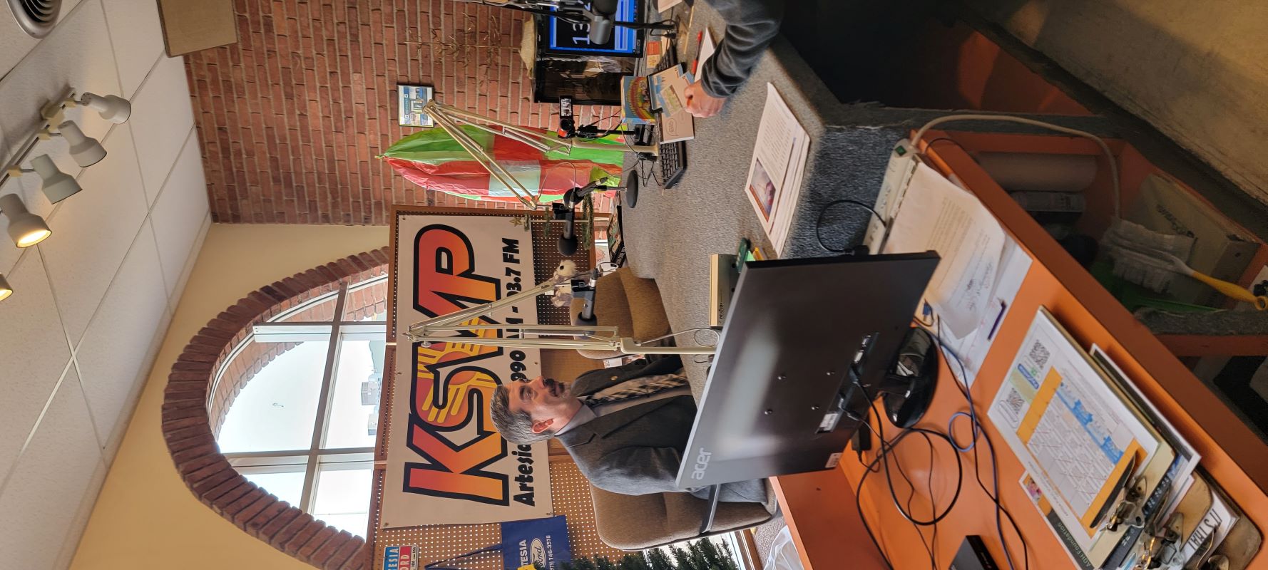 Aaron Irving on a radio